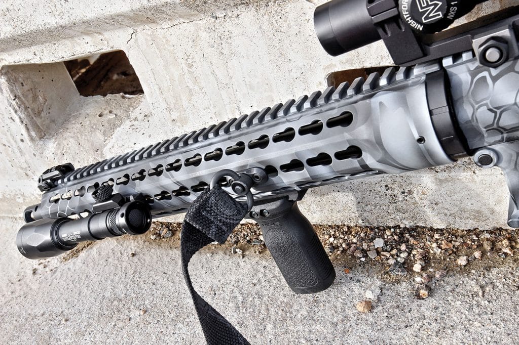A 15-inch rifle length handguard features a full-length Picatinny strip up top and KeyMod attachment points everywhere else...a total of 112 to be exact!