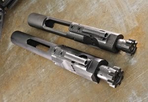 Instead of starting with a smaller .223/5.56mm bolt carrier group (shown on top), in the name of strength, CMMG used the larger .308 bolt carrier group and sized it down accordingly for use with the smaller 7.62x39mm cartridge.