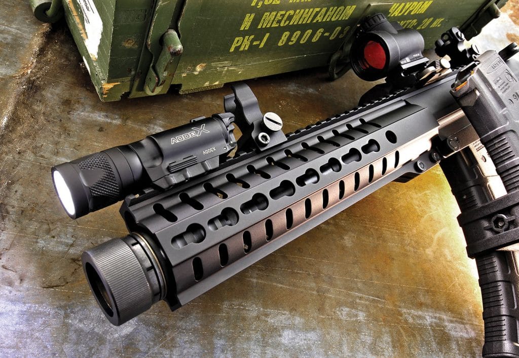 The nine-inch-long CMMG RKM9 handguard gives all the accessory-mounting real estate one could need. Samson flip-up iron sights and a Surefire X300V weaponlight were used throughout testing. The Krink muzzle device had a noticeable positive effect on felt recoil and muzzle blast.